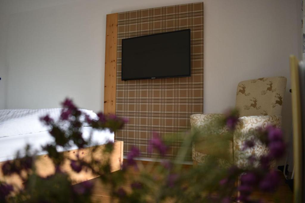 TV a/nebo společenská místnost v ubytování Bucherhof