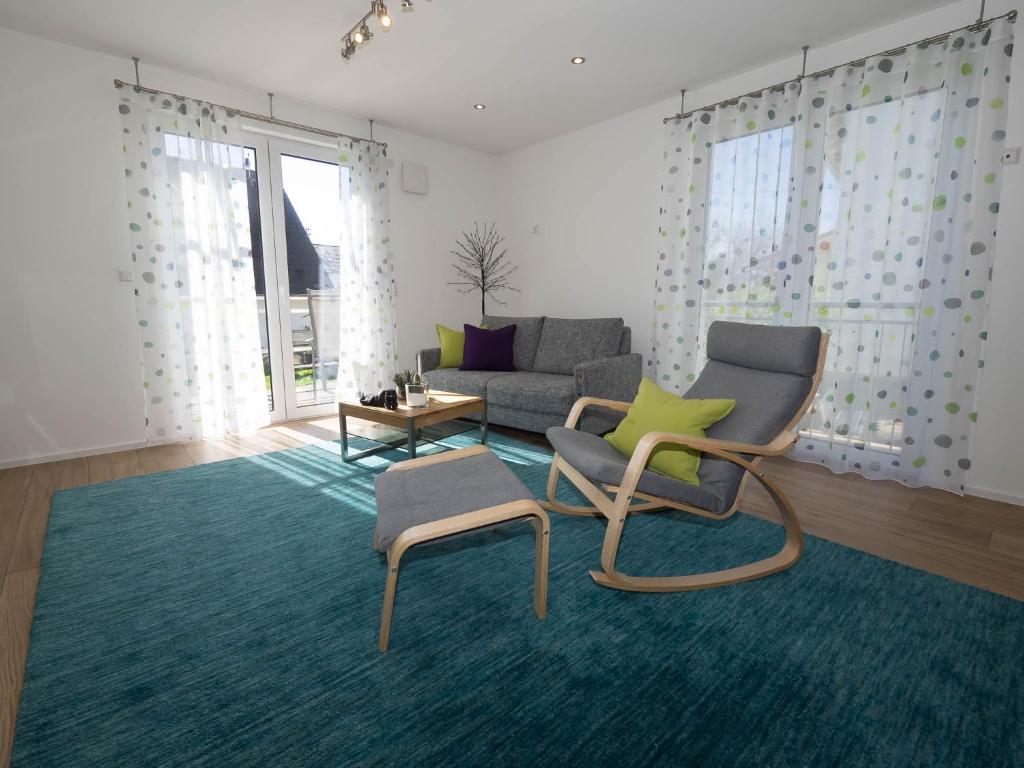 Posezení v ubytování 16Lilien Apartmentwohnung
