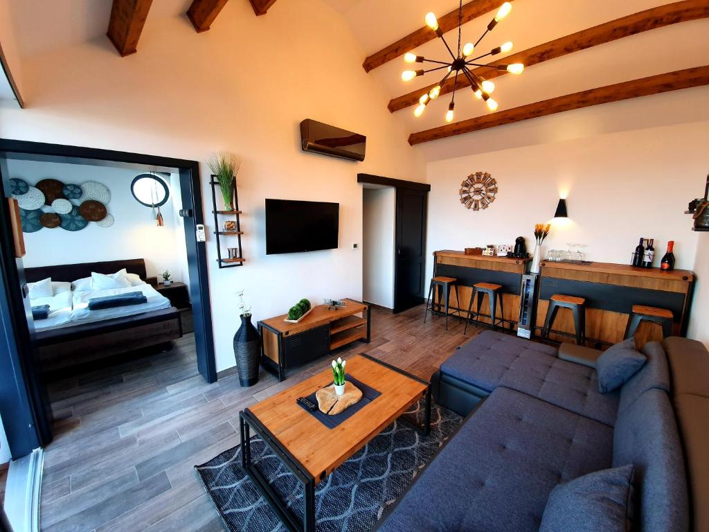 Postel nebo postele na pokoji v ubytování Bagoly Wellness Apartman