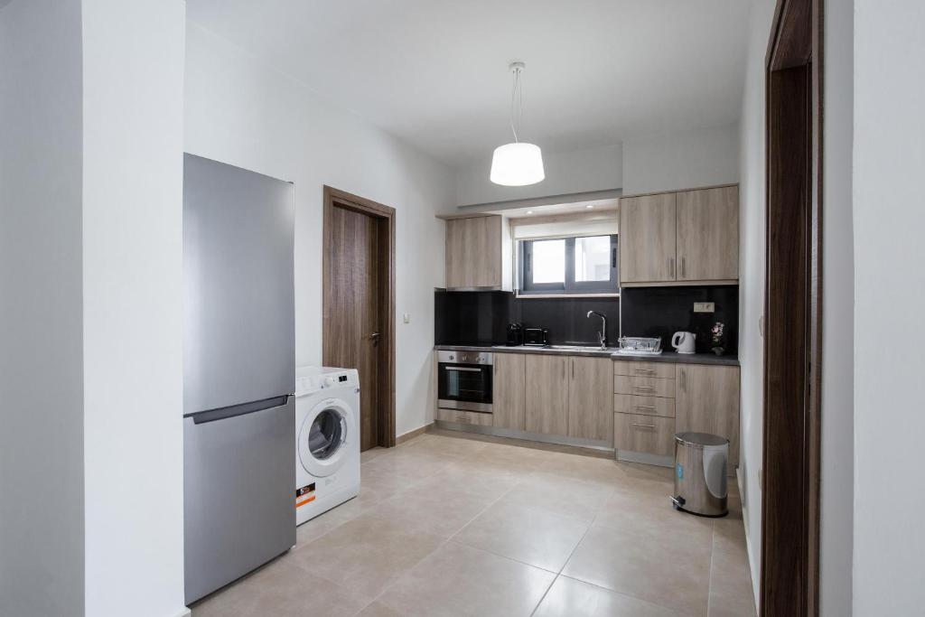 Kuchyň nebo kuchyňský kout v ubytování Casa Ntore Luxury Apartments