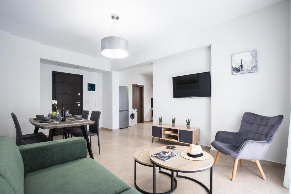 TV a/nebo společenská místnost v ubytování Casa Ntore Luxury Apartments