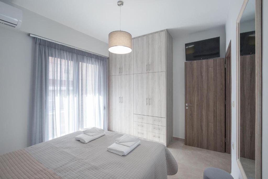 Postel nebo postele na pokoji v ubytování Casa Ntore Luxury Apartments