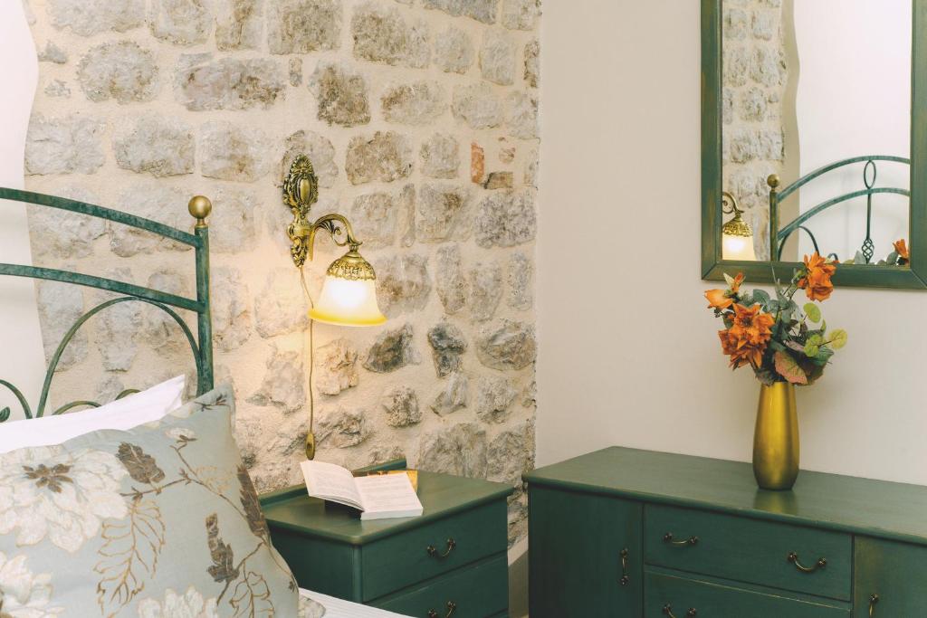 Postel nebo postele na pokoji v ubytování D & Sons Apartments