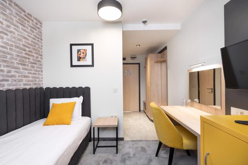 TV a/nebo společenská místnost v ubytování ADEO HOTEL Sport & SPA