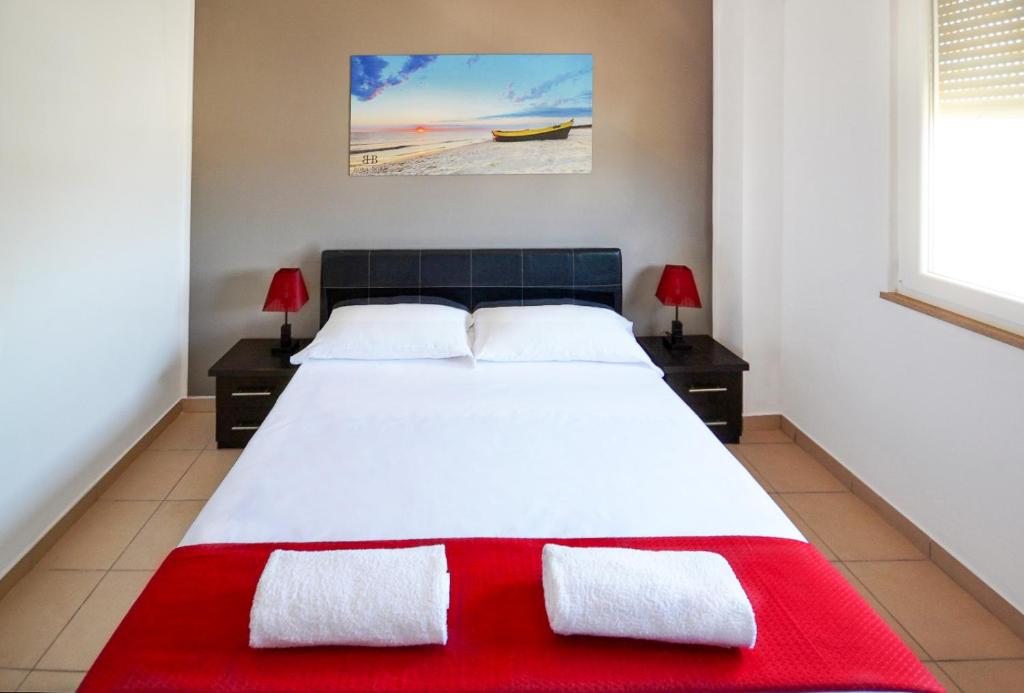 Postel nebo postele na pokoji v ubytování Hotel Bora Bora velipoja