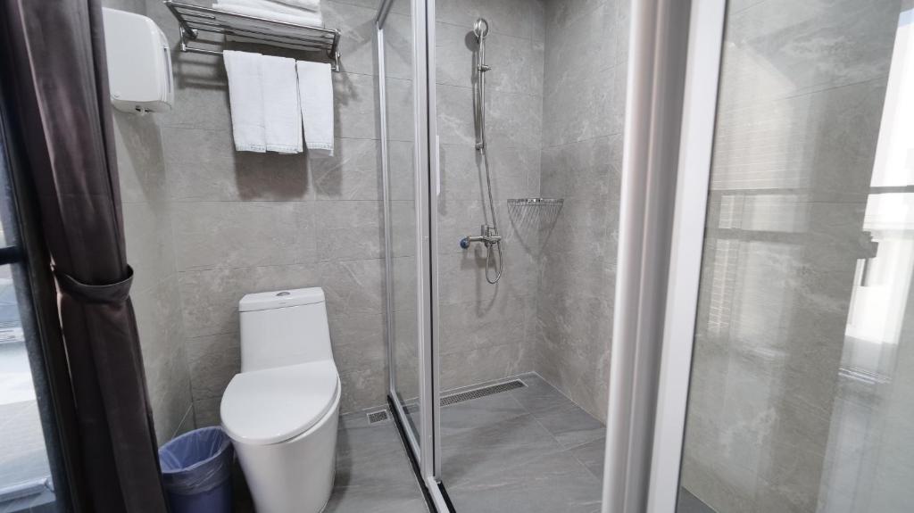 Koupelna v ubytování Apause Hotel