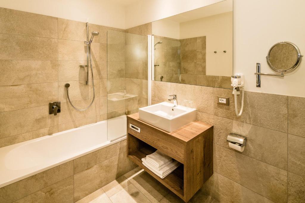 Kúpeľňa v ubytovaní Hotel Touring Dolomites