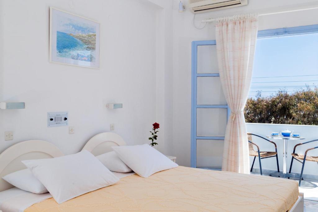 Postel nebo postele na pokoji v ubytování Areti Hotel
