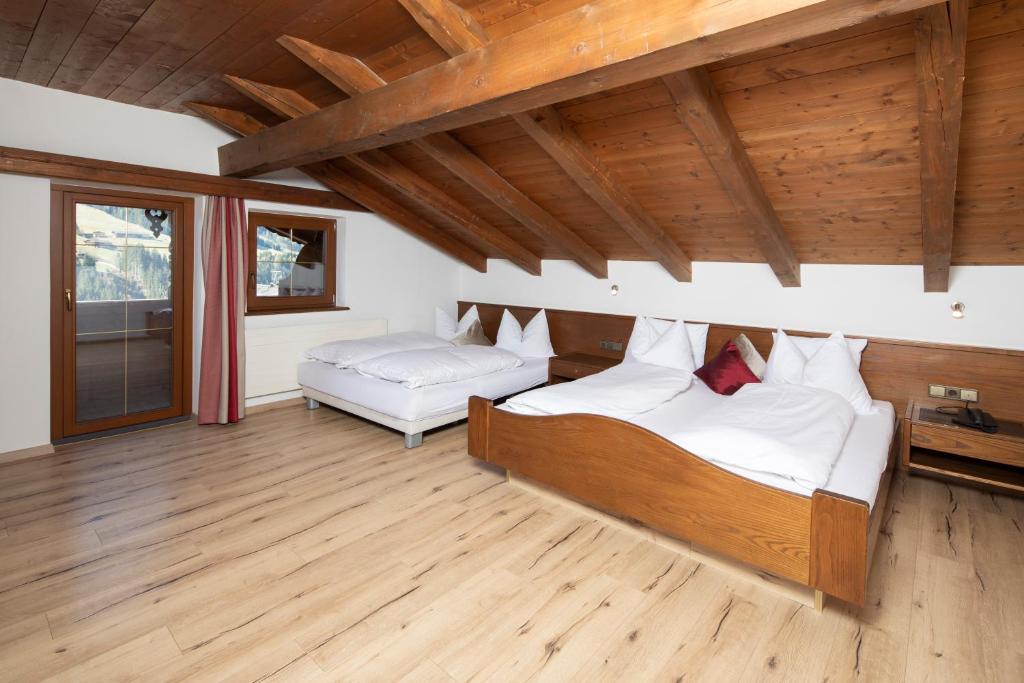 Postel nebo postele na pokoji v ubytování Hotel Andreas