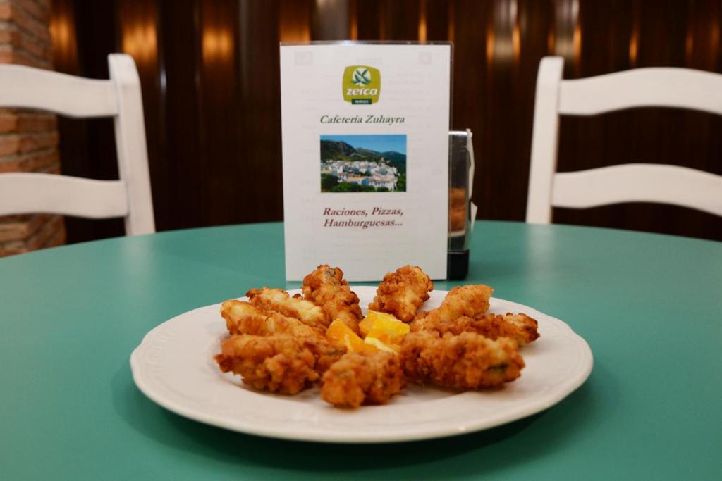 Comida en o cerca de este hotel