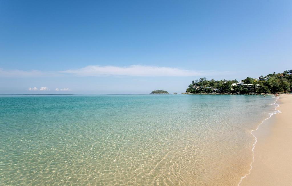 a view of a beach with the ocean at Katathani Phuket Beach Resort - SHA Extra Plus in Kata Beach
