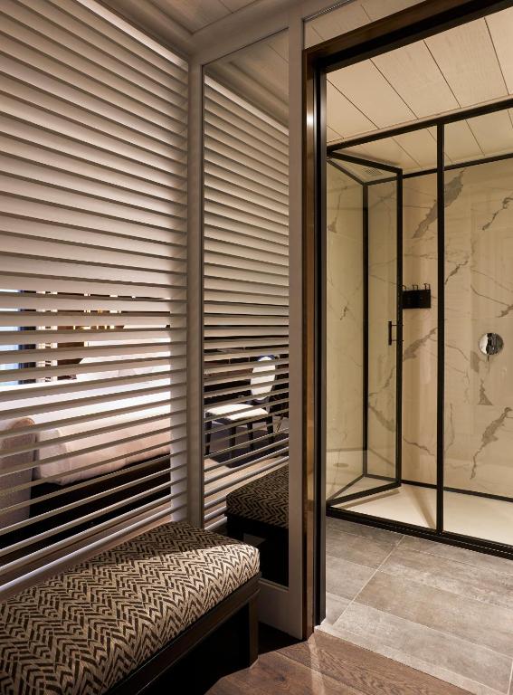 a room with a window with a chair in it at Seventy Barcelona in Barcelona