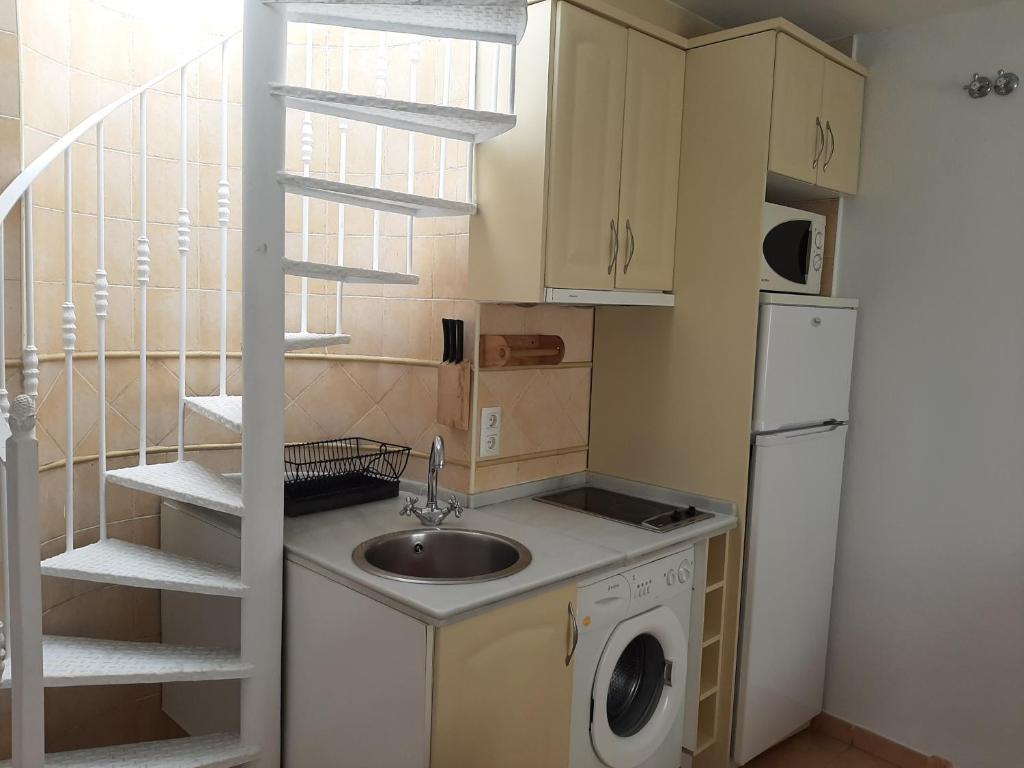 Kuchyň nebo kuchyňský kout v ubytování Atico Con Vistas En Zahara Pueblo