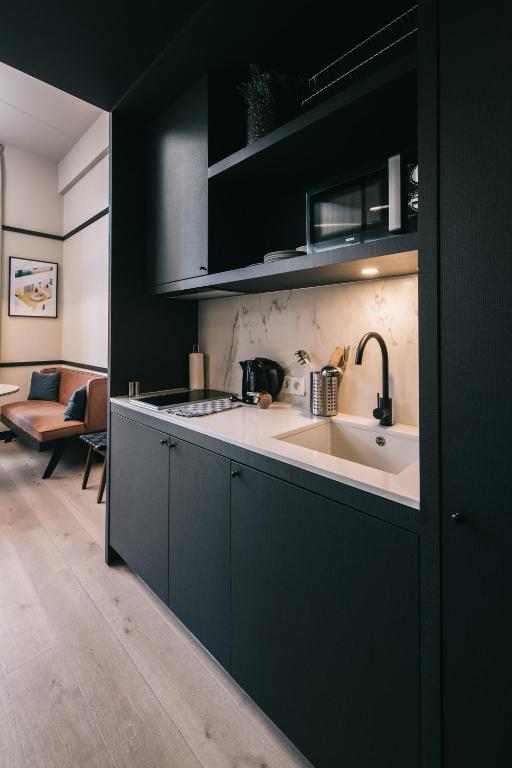 Kuchyň nebo kuchyňský kout v ubytování Getaway Studios Gent