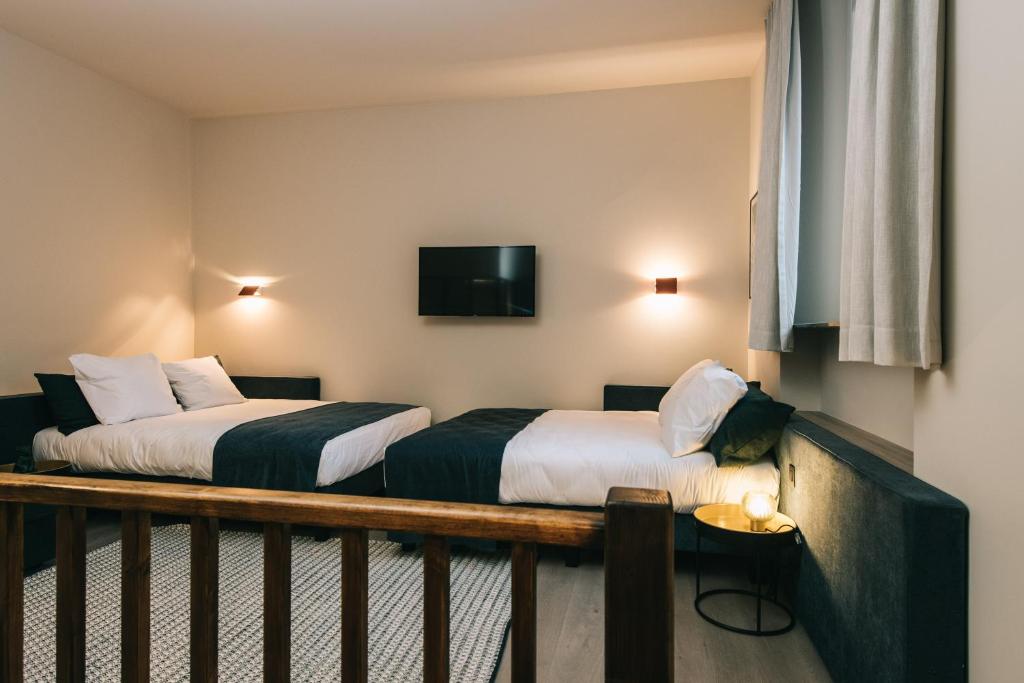 Postel nebo postele na pokoji v ubytování Getaway Studios Gent