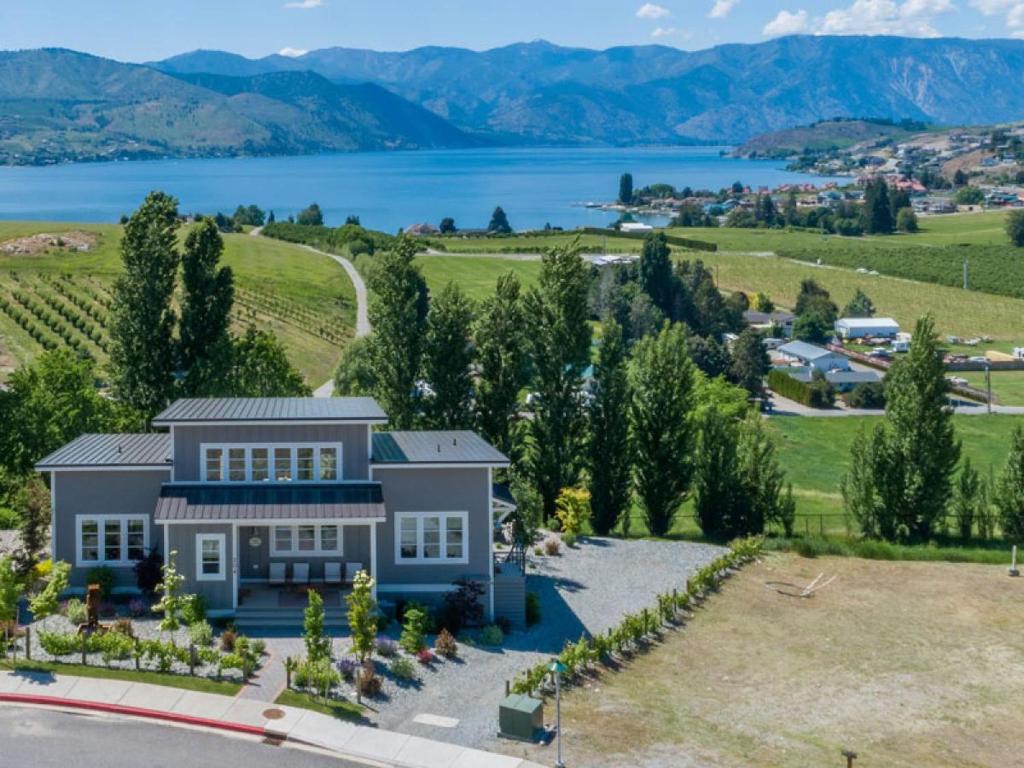 an aerial view of a house with a view of a lake at Hello Sunshine #51 in Chelan