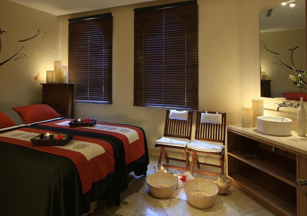Postel nebo postele na pokoji v ubytování Casa Velas Adults Only All Inclusive