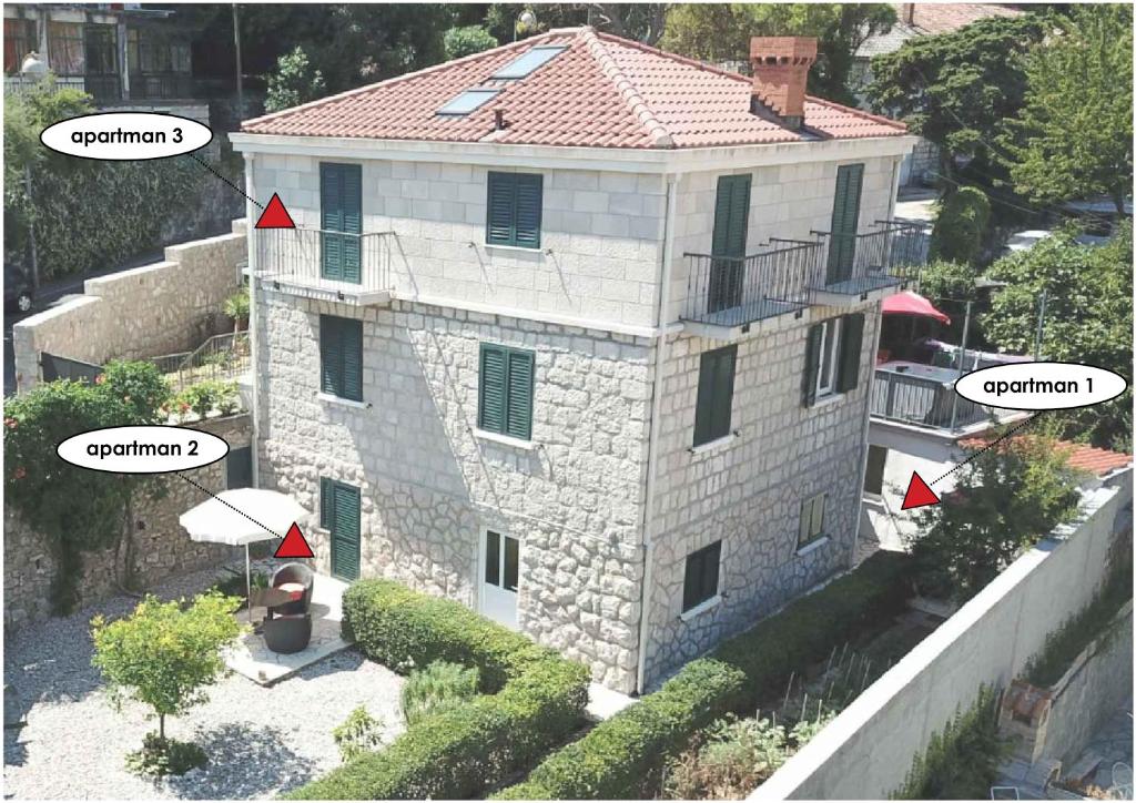 an aerial view of a stone house with a roof at Apartments Corner in Dubrovnik