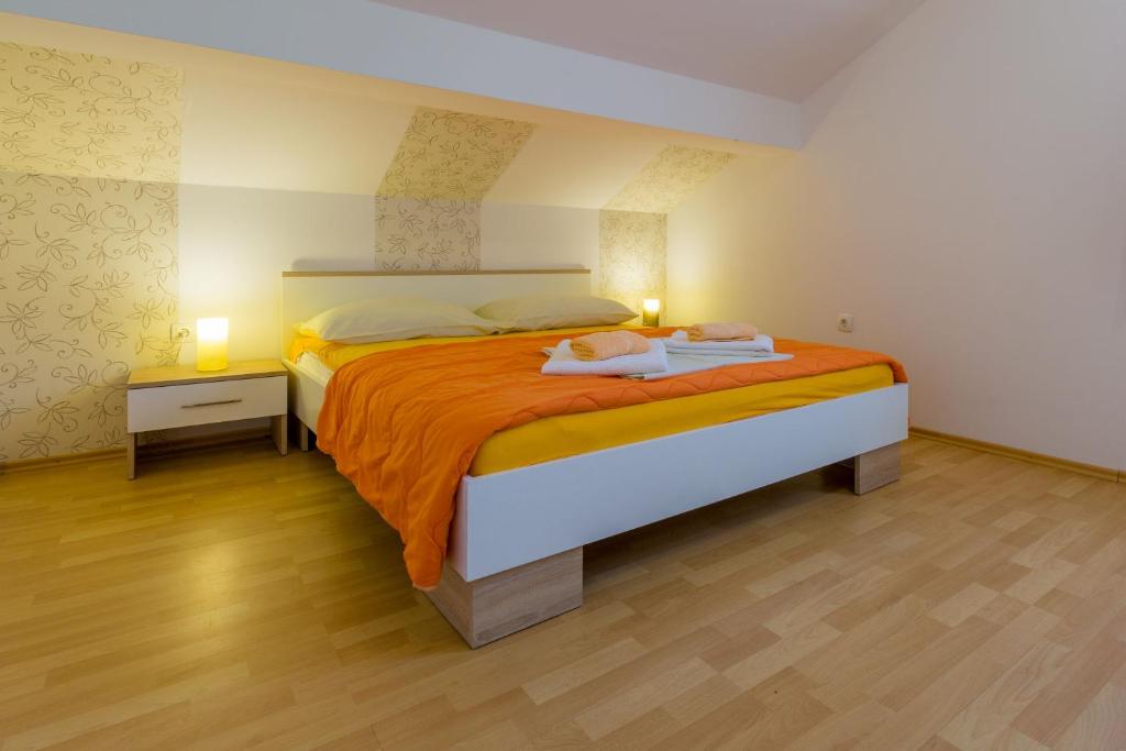 Posteľ alebo postele v izbe v ubytovaní Apartment LINDA