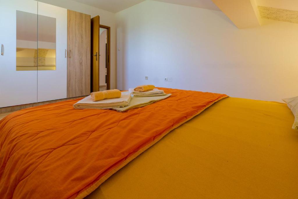 Posteľ alebo postele v izbe v ubytovaní Apartment LINDA