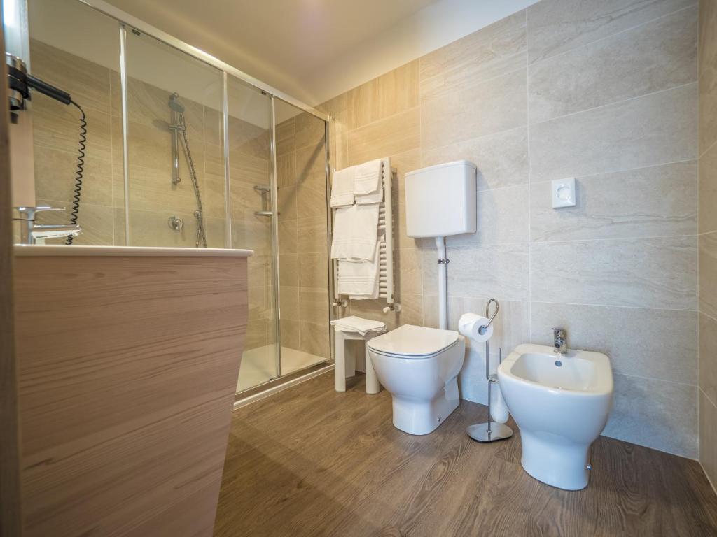 Koupelna v ubytování Hotel Capo Reamol