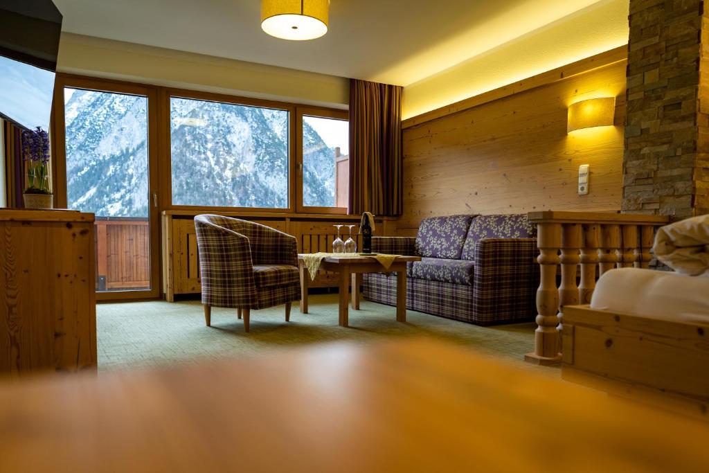 Posezení v ubytování Hotel Huber Hochland
