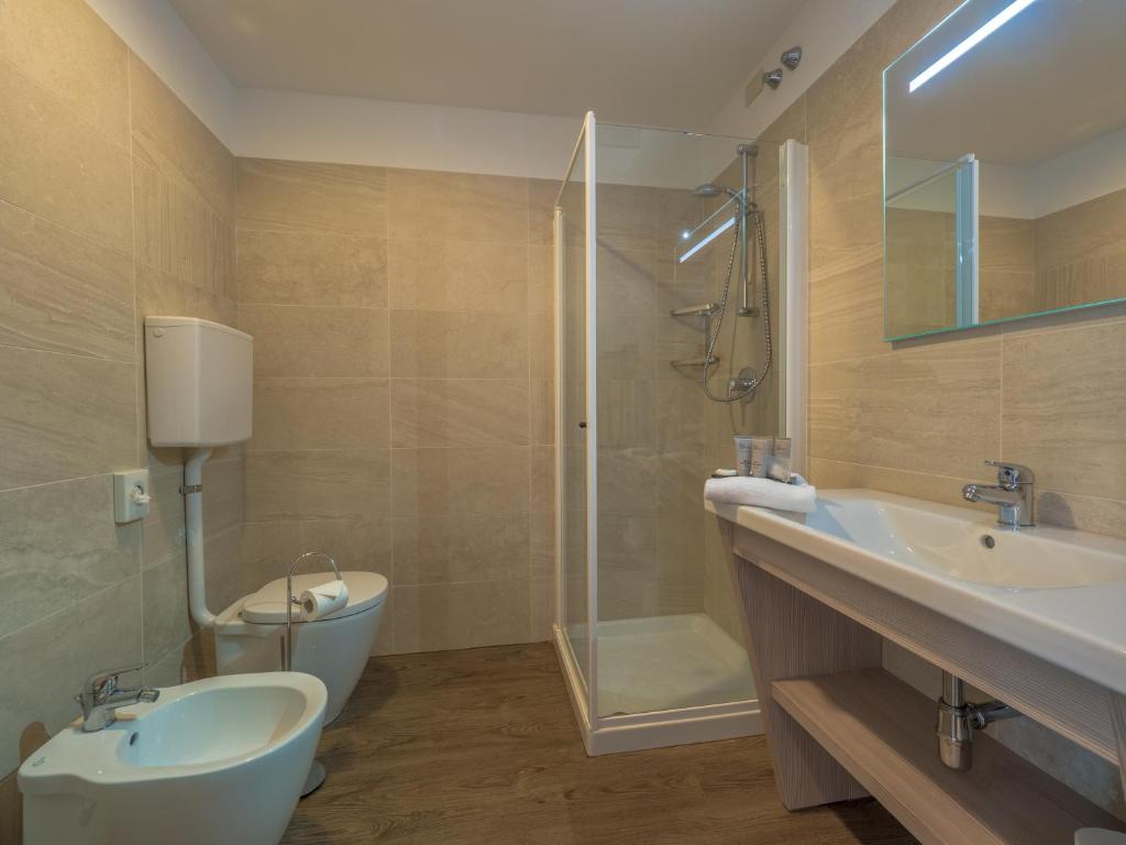 Koupelna v ubytování Hotel Capo Reamol