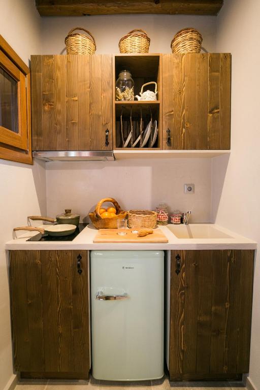 Kuchyň nebo kuchyňský kout v ubytování Karaiskos Agritourism Farm