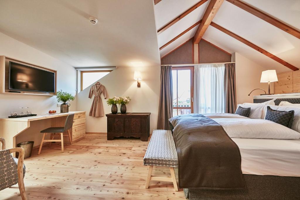 Voodi või voodid majutusasutuse Goldene Rose Karthaus a member of Small Luxury Hotels of the World toas