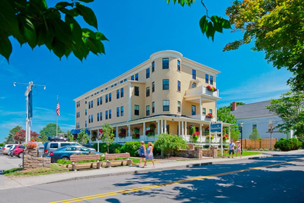 a large building on the corner of a street at Colonial Inn in Ogunquit