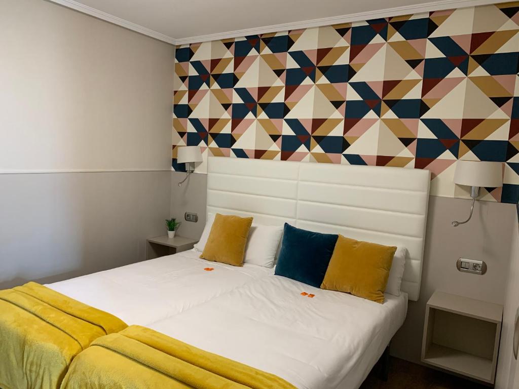 Postel nebo postele na pokoji v ubytování Hotel Artetxe