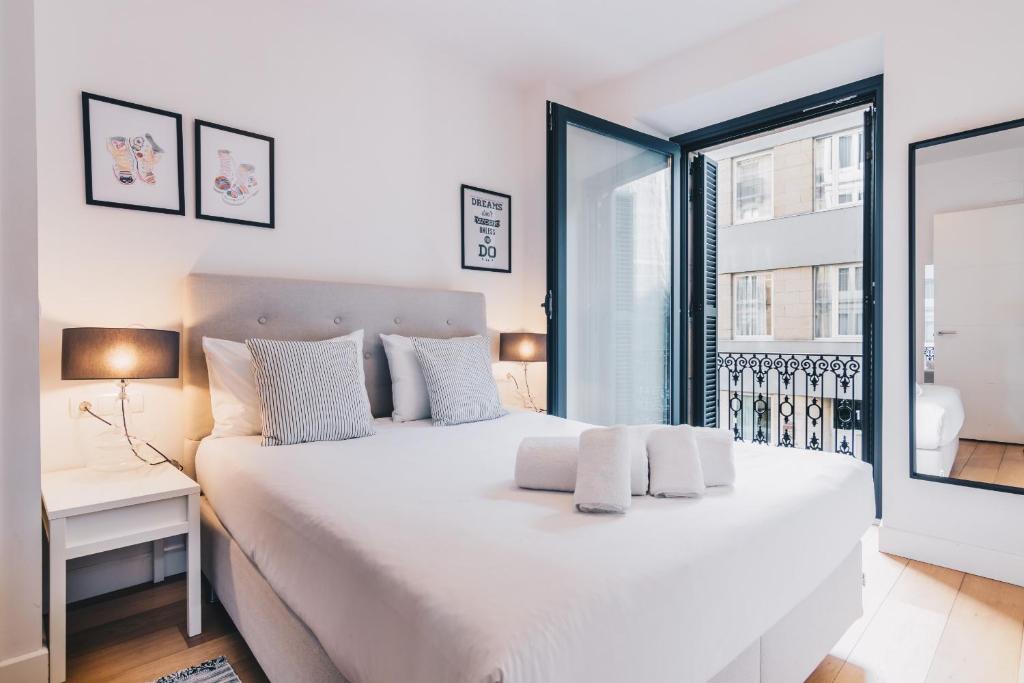 Posteľ alebo postele v izbe v ubytovaní Domo by People Rentals