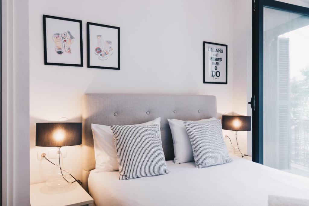 Posteľ alebo postele v izbe v ubytovaní Domo by People Rentals