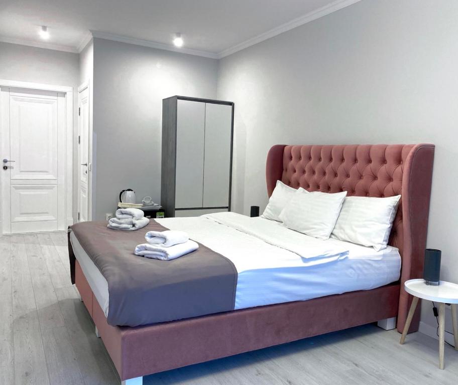 Letto o letti in una camera di Opera Center Hotel & Apartments