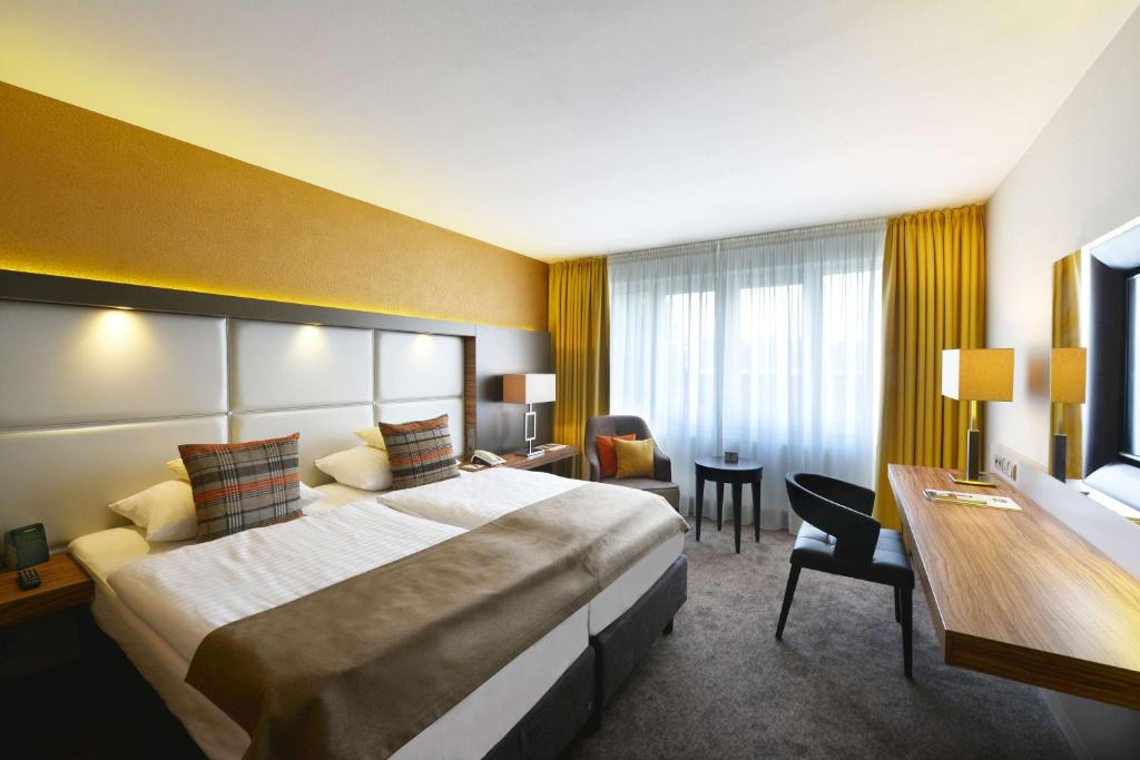 Posteľ alebo postele v izbe v ubytovaní Best Western Plus Delta Park Hotel