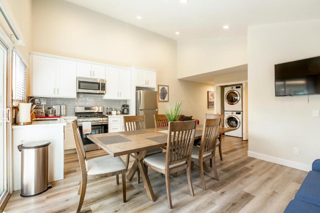 a kitchen and dining room with a table and chairs at @ Marbella Lane 6BR Duplex in Downtown San Jose in San Jose