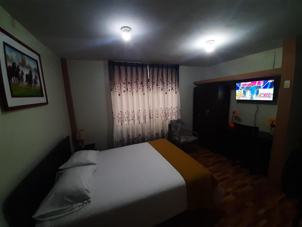 Postel nebo postele na pokoji v ubytování Apartments & Rooms Helena