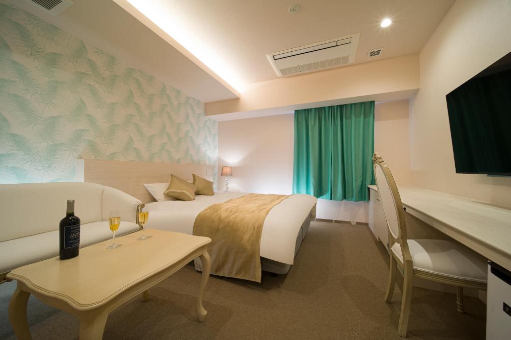 TV a/nebo společenská místnost v ubytování HOTEL LASCALA