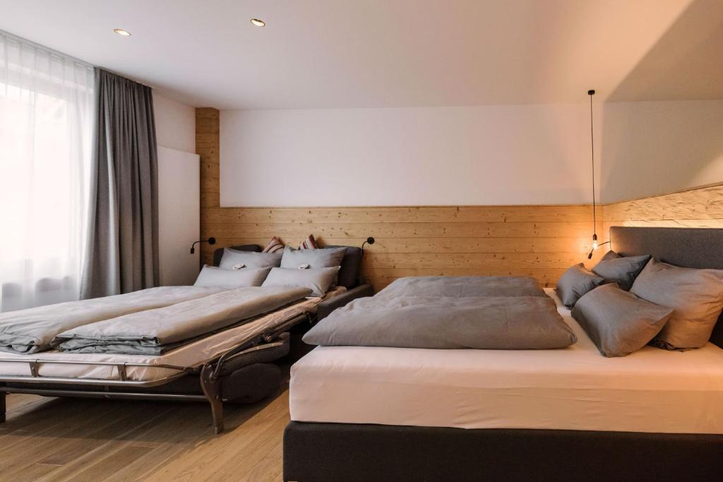 Postel nebo postele na pokoji v ubytování Hotel Johanns