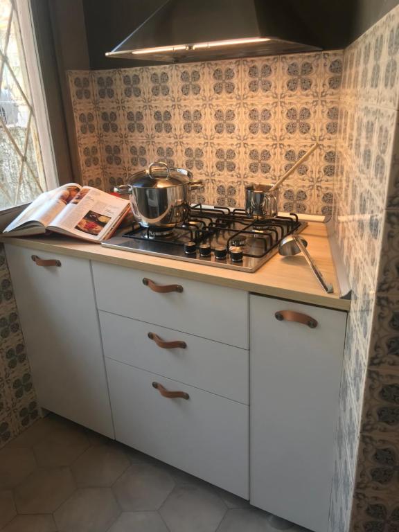 Kuchyň nebo kuchyňský kout v ubytování B&B Villa Rosalinda