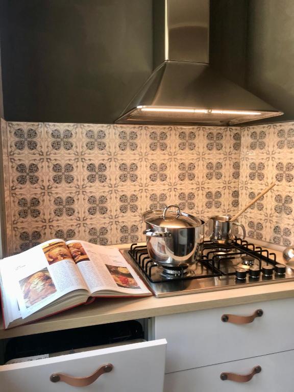 Kuchyň nebo kuchyňský kout v ubytování B&B Villa Rosalinda