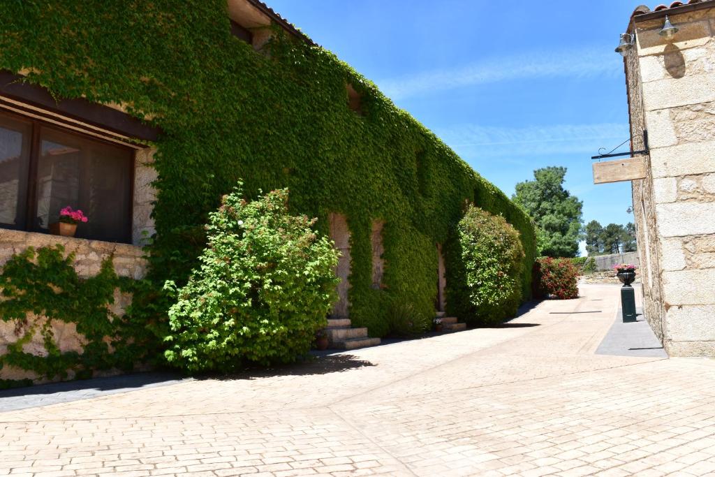 Jardín al aire libre en HOTEL RURAL A VELHA FABRICA