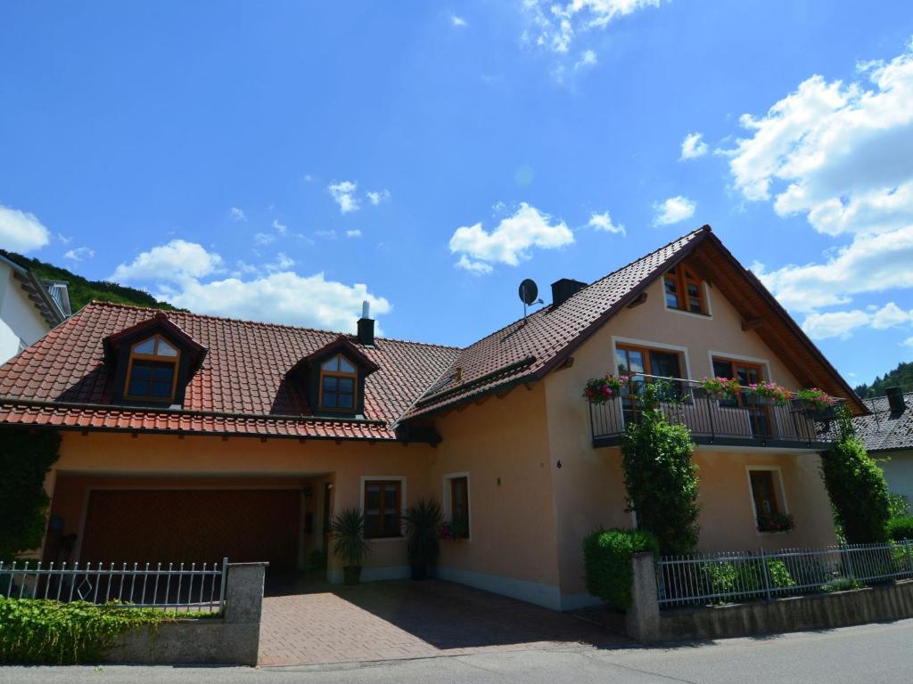 a house with a tiled roof at Apartment with private terrace in Prunn in Riedenburg