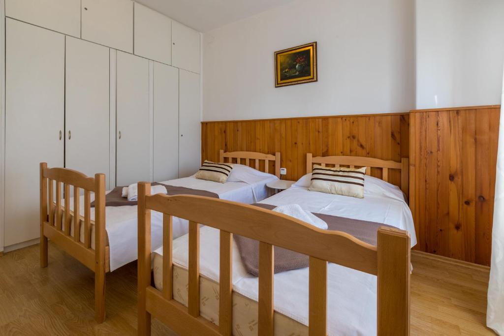 Postel nebo postele na pokoji v ubytování Apartment Roni
