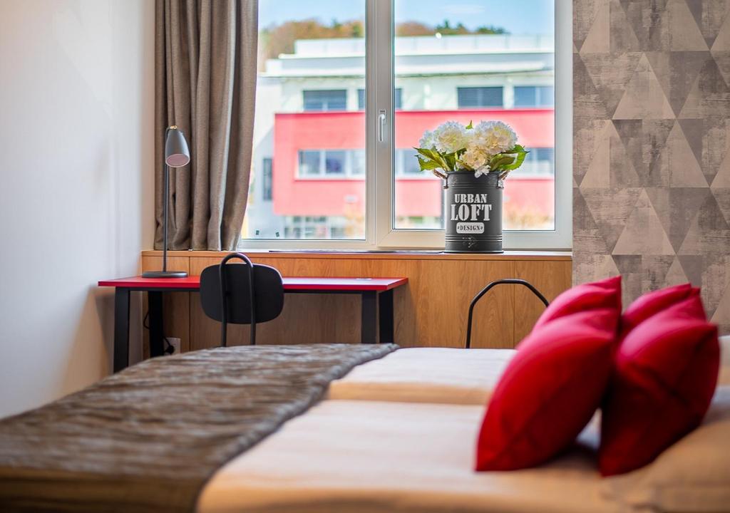 Urban Ring Hotelにあるベッド