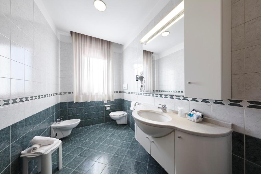 Koupelna v ubytování Hotel Aqua
