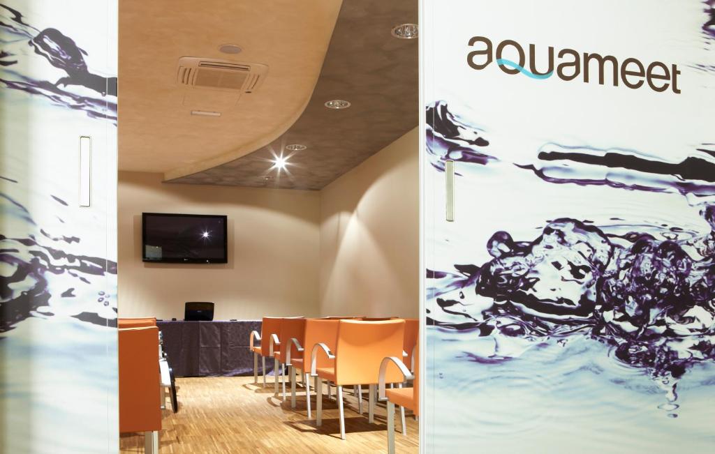 TV a/nebo společenská místnost v ubytování Hotel Aqua