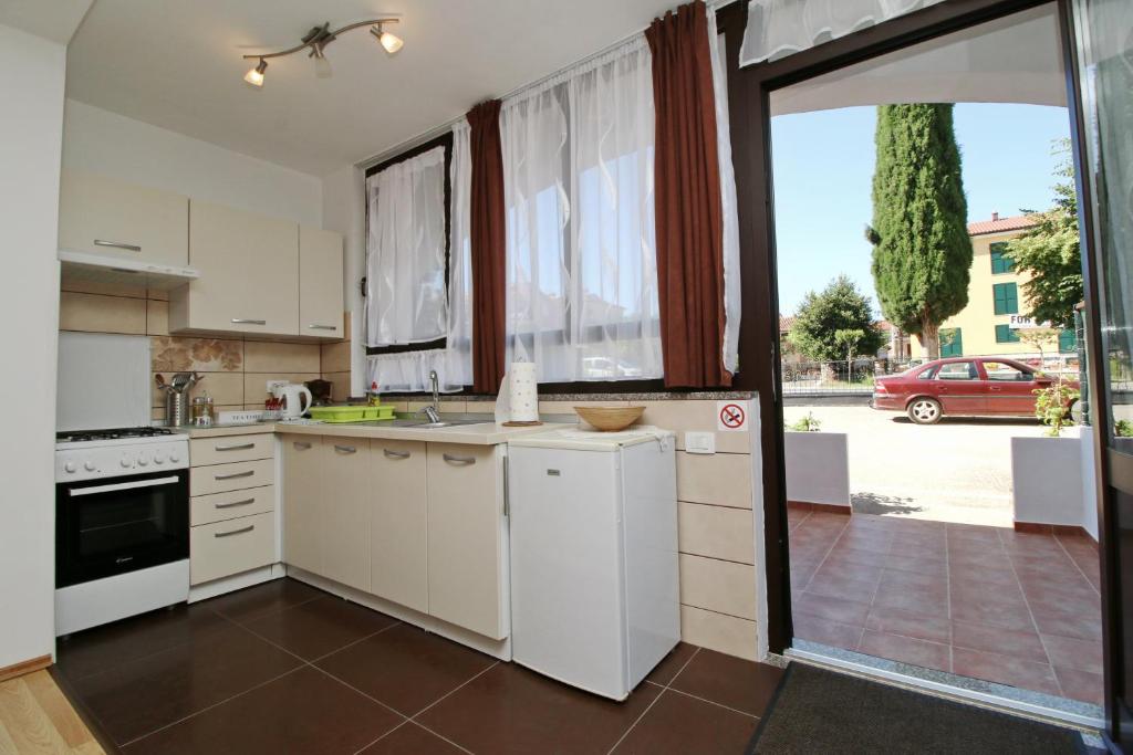 Kuchyň nebo kuchyňský kout v ubytování Apartment Svid