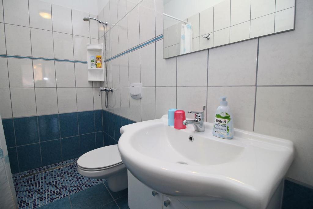 Koupelna v ubytování Apartment Svid