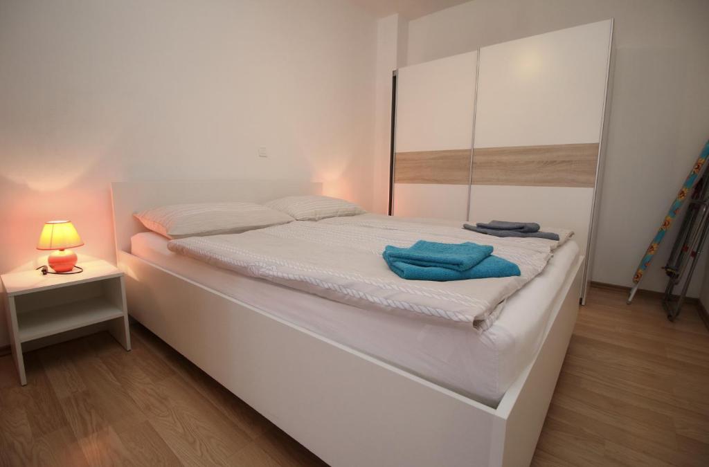Postel nebo postele na pokoji v ubytování Apartment Svid